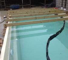 PLancher de protection pour la piscine pendant les travaux